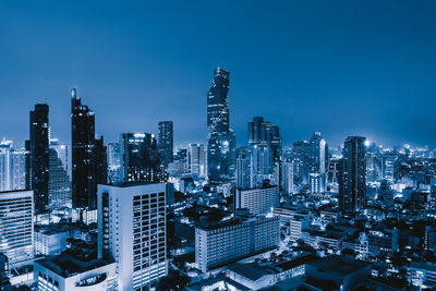 Modern buildings in city against sky