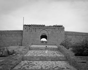 Historic building against cloudy sky