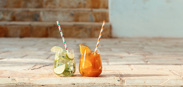 Two refreshing cocktails in a garden close up