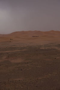 Scenic view of desert against sky