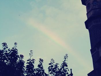 Low angle view of rainbow against sky