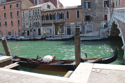 Boats moored in canal