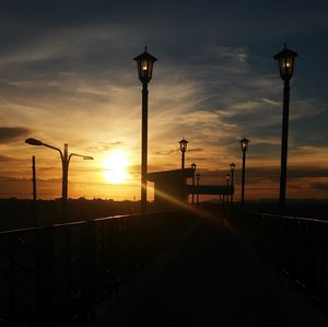 Street light against sky at night