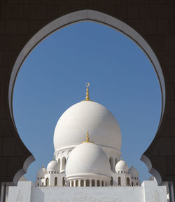 Low angle view of cathedral against clear blue sky