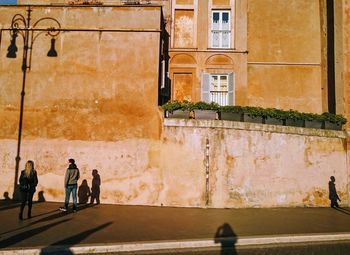 Group of people walking in building