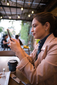 Young man using mobile phone