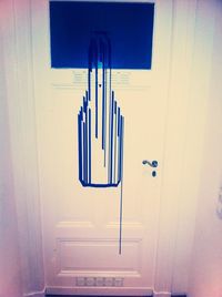 Low angle view of tree against blue sky