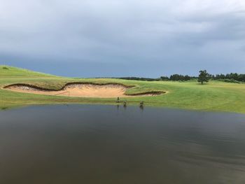 Scenic view of lake against sky