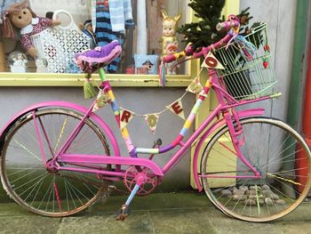 Close-up of bicycle against wall