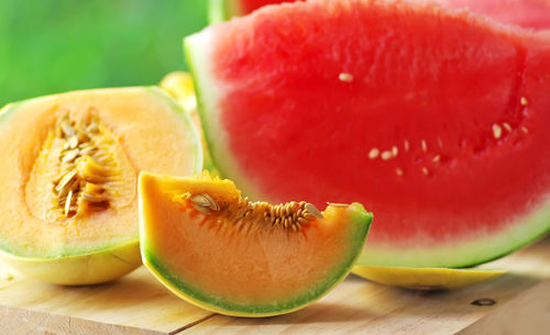 Muskmelon and watermelon on table