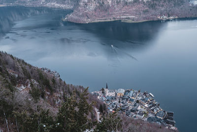 High angle view of buildings by sea