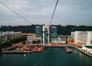 High angle view of buildings in city against sky