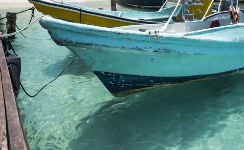 Boats moored in sea