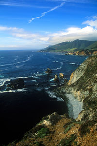 Scenic view of sea against cloudy sky