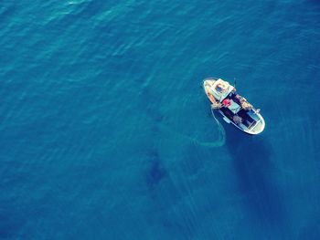 High angle view of man swimming in sea