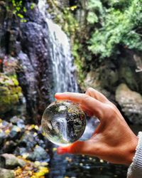 Person holding rock