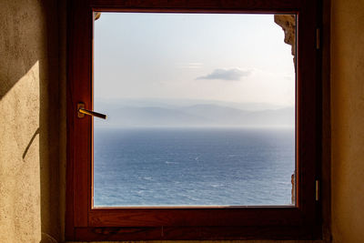 Sea seen through window