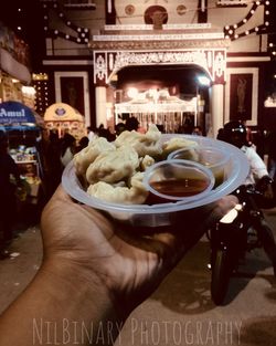 Close-up of man holding ice cream