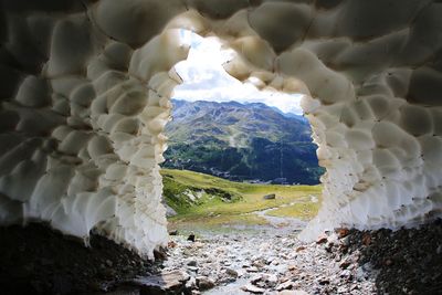 Scenic view of snow covered land