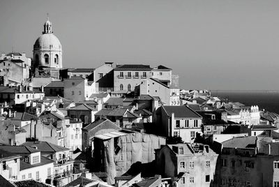 National pantheon by buildings against clear sky