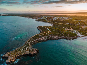 High angle view of sea against sky during sunset