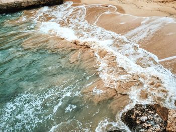 Waves splashing on rocks