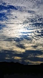 Scenic view of silhouette landscape against sky during sunset