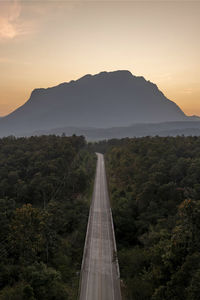 Scenic view of mountains against sky during sunset
