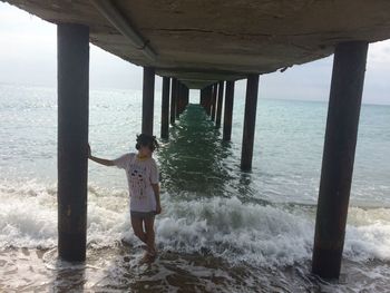 Woman standing on beach