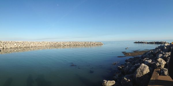 Scenic view of sea against clear sky