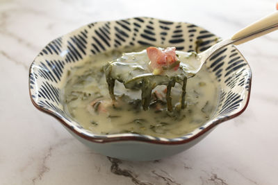 Caldo verde soup, a portuguese kale soup with chorizo