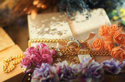 Close-up of pink roses on table