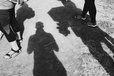 Low section of people standing on floor