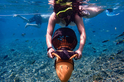 Man swimming in sea