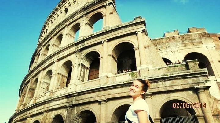 architecture, arch, built structure, history, low angle view, young adult, building exterior, tourism, lifestyles, tourist, clear sky, leisure activity, travel, travel destinations, old ruin, famous place, person, culture