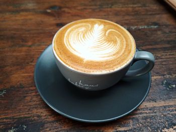 Close-up of cappuccino on table