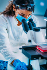 Female junior researcher in the lab