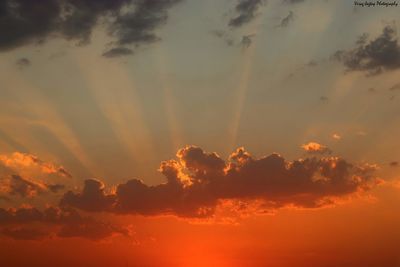 Low angle view of dramatic sky during sunset