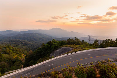 Scenic view of mountains against sky during sunset