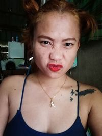 Portrait of beautiful woman at home