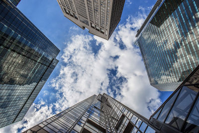 Low angle view of modern buildings against sky