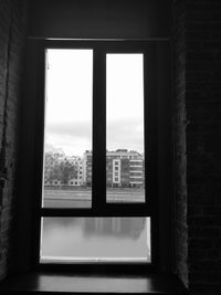 Buildings seen through window