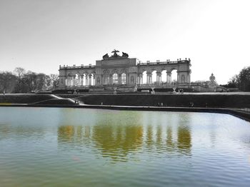 Reflection of historic building in water