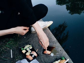 Close-up of woman standing in pond