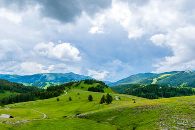 A picturesque landscape view of the french alps mountains on a cloudy summer day