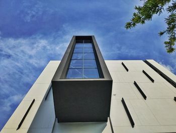 Low angle view of modern building against sky