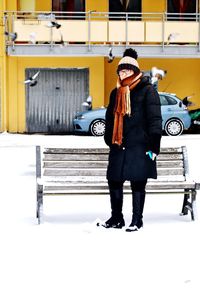 Full length of man standing in snow