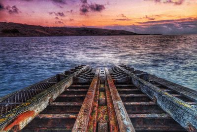 View of pier at sunset