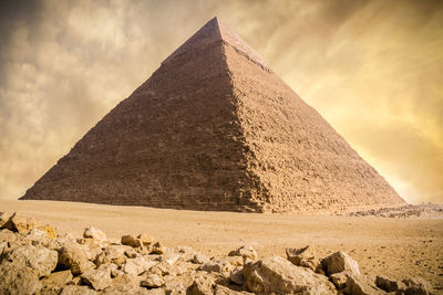 View the giza pyramid against beautiful sunset sky