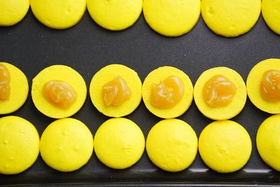 Directly above shot of yellow macaroons